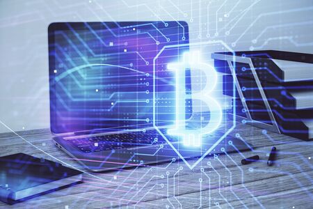 Blockchain theme hologram with desktop office background. Double exposure. Crypto business concept.の写真素材
