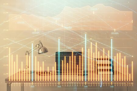 Stock market chart and desktop office computer background. Multi exposure. Concept of financial analysis.の写真素材