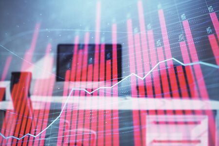 Stock market chart and desktop office computer background. Multi exposure. Concept of financial analysis.の写真素材