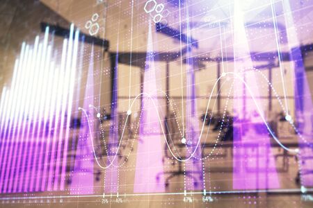 Stock and bond market graph with trading desk bank office interior on background. Multi exposure. Concept of financial analysisの写真素材