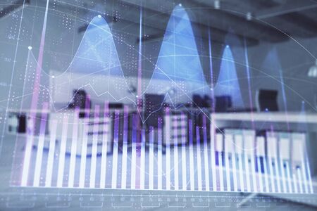 Stock market chart with trading desk bank office interior on background. Double exposure. Concept of financial analysisの写真素材