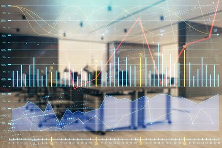 Stock market chart with trading desk bank office interior on background. Double exposure. Concept of financial analysisの写真素材