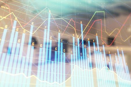 Stock market chart with trading desk bank office interior on background. Double exposure. Concept of financial analysisの写真素材