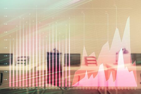 Stock and bond market graph with trading desk bank office interior on background. Multi exposure. Concept of financial analysisの写真素材