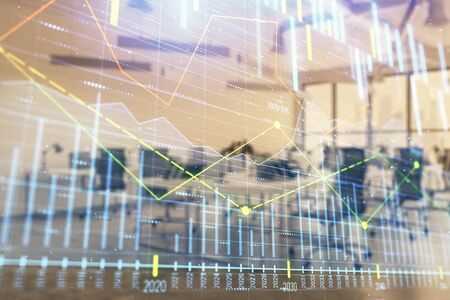 Stock and bond market graph with trading desk bank office interior on background. Multi exposure. Concept of financial analysisの写真素材