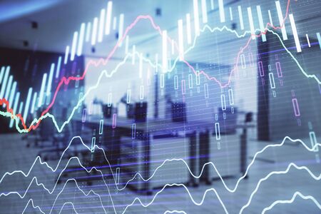 Stock market chart with trading desk bank office interior on background. Double exposure. Concept of financial analysisの写真素材