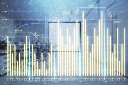Stock market chart with trading desk bank office interior on background. Double exposure. Concept of financial analysisの写真素材