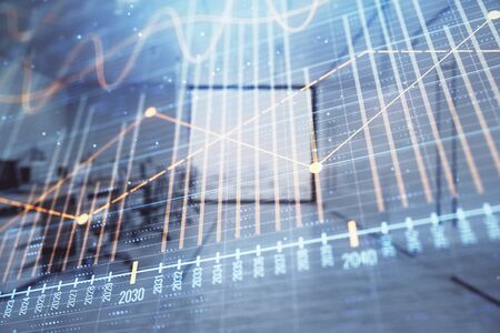 Stock market chart with trading desk bank office interior on background. Double exposure. Concept of financial analysisの写真素材