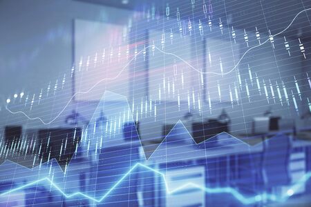 Stock market chart with trading desk bank office interior on background. Double exposure. Concept of financial analysisの写真素材