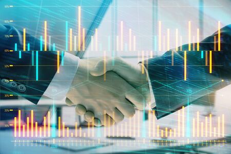 Multi exposure of financial graph on office background with two businessmen handshake. Concept of success in businessの写真素材