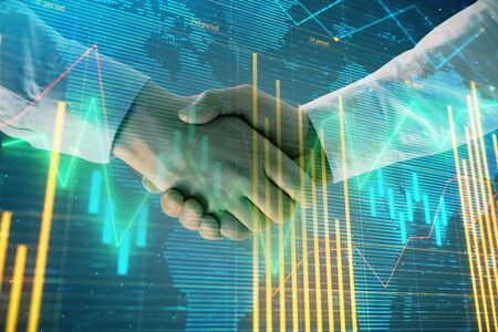Multi exposure of forex graph and world map on abstract background with two businessmen handshake. Concept of success on international marketsの写真素材