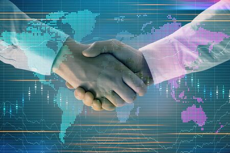 Multi exposure of forex graph and world map on abstract background with two businessmen handshake. Concept of success on international marketsの写真素材