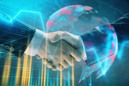 Multi exposure of forex graph and world map on abstract background with two businessmen handshake. Concept of success on international marketsの写真素材