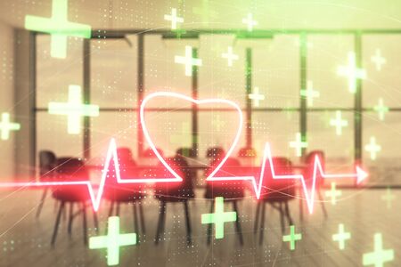 Double exposure of heart hologram on conference room background. Concept of medical education