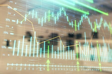 Stock market chart with trading desk bank office interior on background. Double exposure. Concept of financial analysisの写真素材