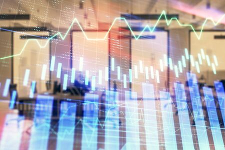 Stock market chart with trading desk bank office interior on background. Double exposure. Concept of financial analysisの写真素材