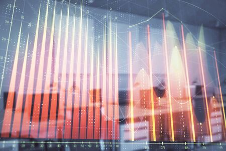 Stock market chart with trading desk bank office interior on background. Double exposure. Concept of financial analysisの写真素材