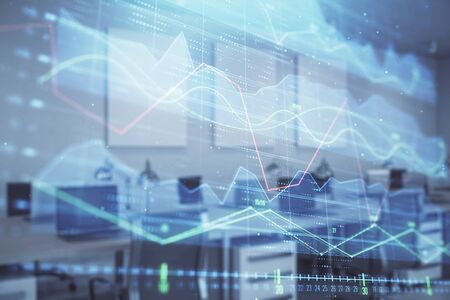 Stock market chart with trading desk bank office interior on background. Double exposure. Concept of financial analysisの写真素材
