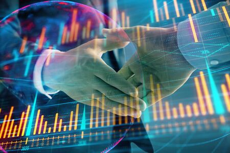 Multi exposure of forex graph and world map on abstract background with two businessmen handshake. Concept of success on international marketsの写真素材