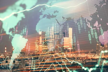 Double exposure of financial graph and world map on city view background. Concept of financial market research and analysisの写真素材
