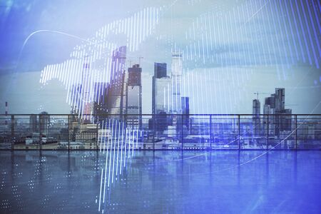 Map hologram with city view from roof background. Double exposure.の写真素材