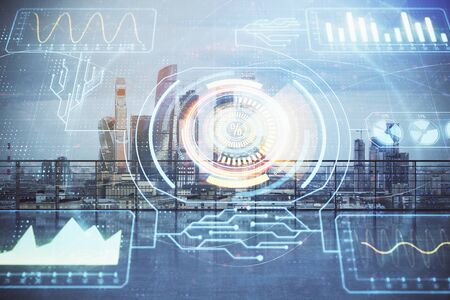 Technology theme hologram with city view from roof background. Double exposure.の写真素材