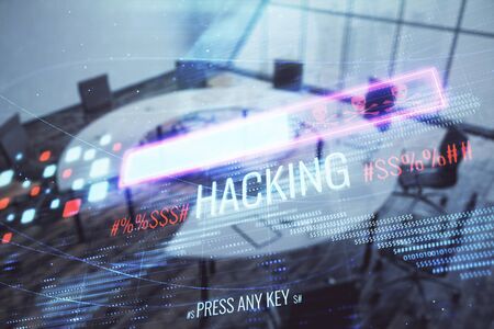 Double exposure of hacking theme hologram on conference room background. Concept of cyberpiracyの写真素材