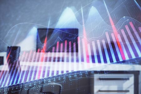 Stock market chart and desktop office computer background. Multi exposure. Concept of financial analysis.の写真素材