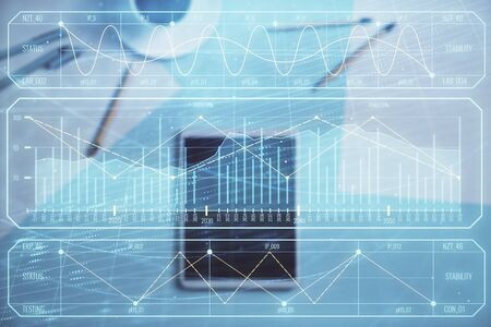 Double exposure of forex graph on digital tablet laying on table background. Concept of market analysisの写真素材