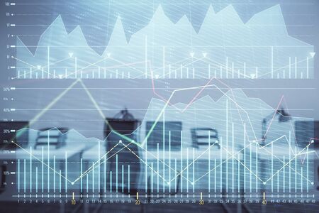 Stock and bond market graph with trading desk bank office interior on background. Multi exposure. Concept of financial analysisの写真素材