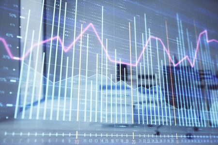 Stock market chart with trading desk bank office interior on background. Double exposure. Concept of financial analysisの写真素材