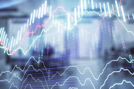 Stock market chart with trading desk bank office interior on background. Double exposure. Concept of financial analysisの写真素材