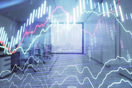 Stock market chart with trading desk bank office interior on background. Double exposure. Concept of financial analysisの写真素材