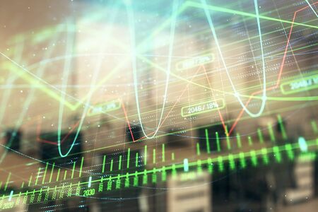Stock market chart with trading desk bank office interior on background. Double exposure. Concept of financial analysisの写真素材