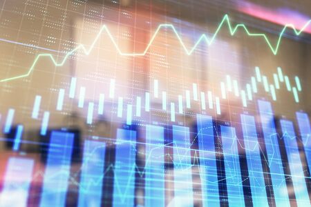 Stock market chart with trading desk bank office interior on background. Double exposure. Concept of financial analysisの写真素材