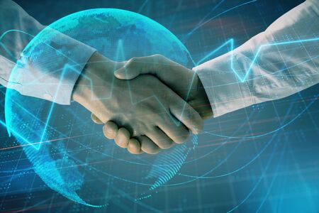 Multi exposure of forex graph and world map on abstract background with two businessmen handshake. Concept of success on international marketsの写真素材