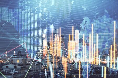 Double exposure of financial graph and world map on city veiw background. Concept of financial market research and analysisの写真素材