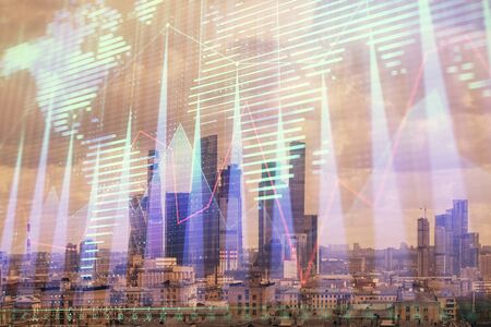 Double exposure of financial graph and world map on city veiw background. Concept of financial market research and analysisの写真素材