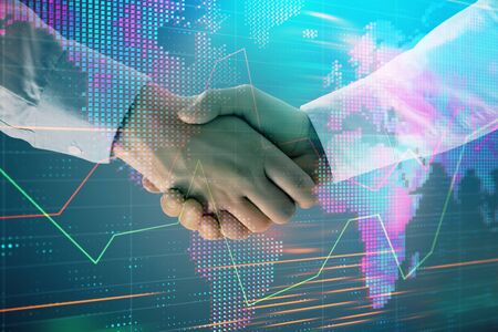 Multi exposure of forex graph and world map on abstract background with two businessmen handshake. Concept of success on international marketsの写真素材