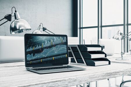 Cabinet desktop interior with financial charts and graphs on computer screen. Concept of stock market analysis and trading. 3d rendering.の写真素材
