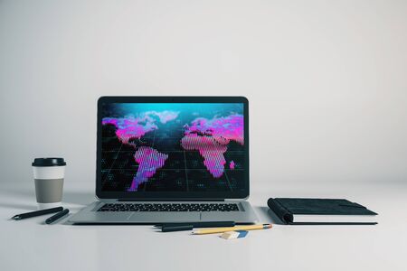 Laptop closeup with world map on computer screen. International education concept. 3d rendering.の写真素材