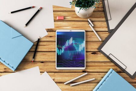 Digital tablet closeup top view with financial graph on screen. Online trading application concept. 3d rendering.の写真素材