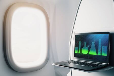 Laptop closeup inside airplane with laboratory flasks on screen. Online education concept. 3d rendering.の写真素材