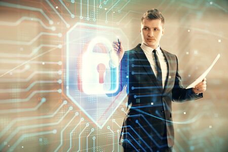 Businessman and lock icon hologram. Double exposure. Concept of data securityの写真素材
