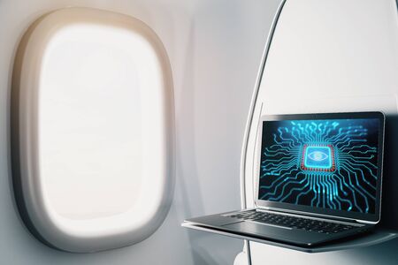 Laptop closeup inside airplane with technology picture on screen. Technology concept. 3d rendering.の写真素材