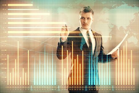 Businessman and forex graph and world map hologram. Double exposure. Concept of financial education and analysisの写真素材