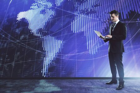 Businessman and world map hologram. Double exposure. Concept of international financeの写真素材