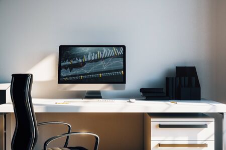 Cabinet desktop interior with financial charts and graphs on computer screen. Concept of stock market analysis and trading. 3d rendering.の写真素材