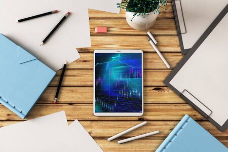 Digital tablet closeup top view with financial graph on screen. Online trading application concept. 3d rendering.の写真素材