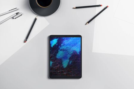 Digital tablet closeup top view with world map on screen. Online international trading concept. 3d rendering.の写真素材